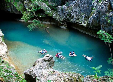 Cave Tubing in the Caves Branch River